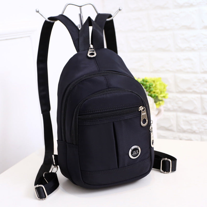 Lightweight Nylon Travel Chest Pack | Convertible Crossbody Sling & Mini Backpack by Passport Outfitters