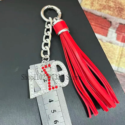 Stainless Steel Greek Letter Delta Shield Keychain With Red Tassel by Passport Outfitters