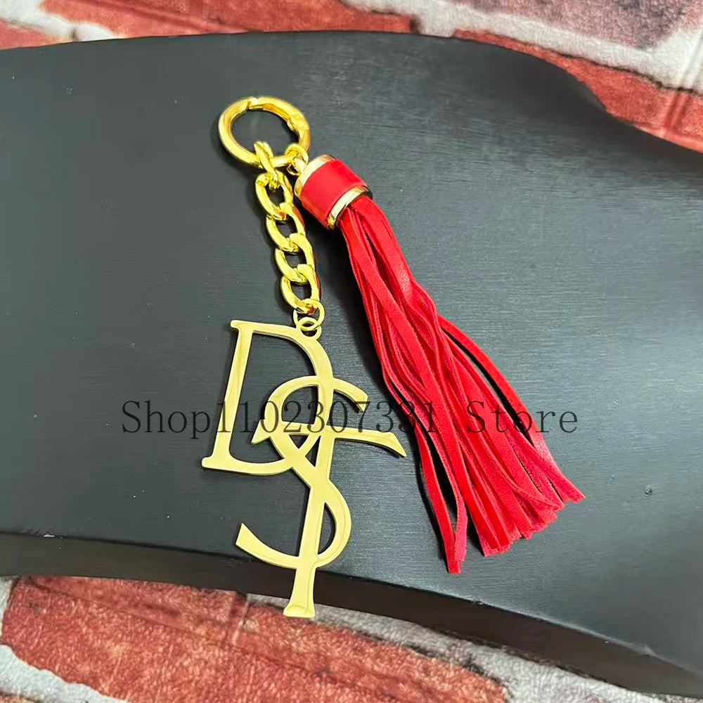 Stainless Steel Greek Letter Delta Shield Keychain With Red Tassel by Passport Outfitters