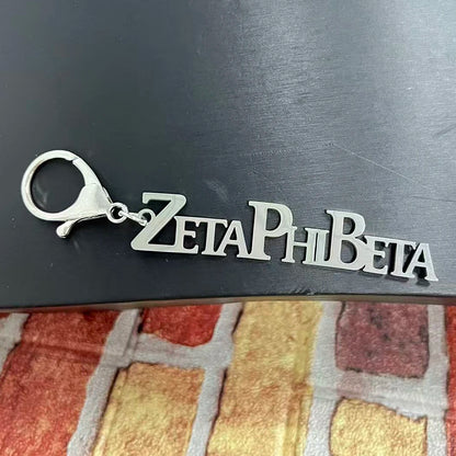 Party sisters Gift Greek Organization Letter Stainless Steel Keychain by Passport Outfitters